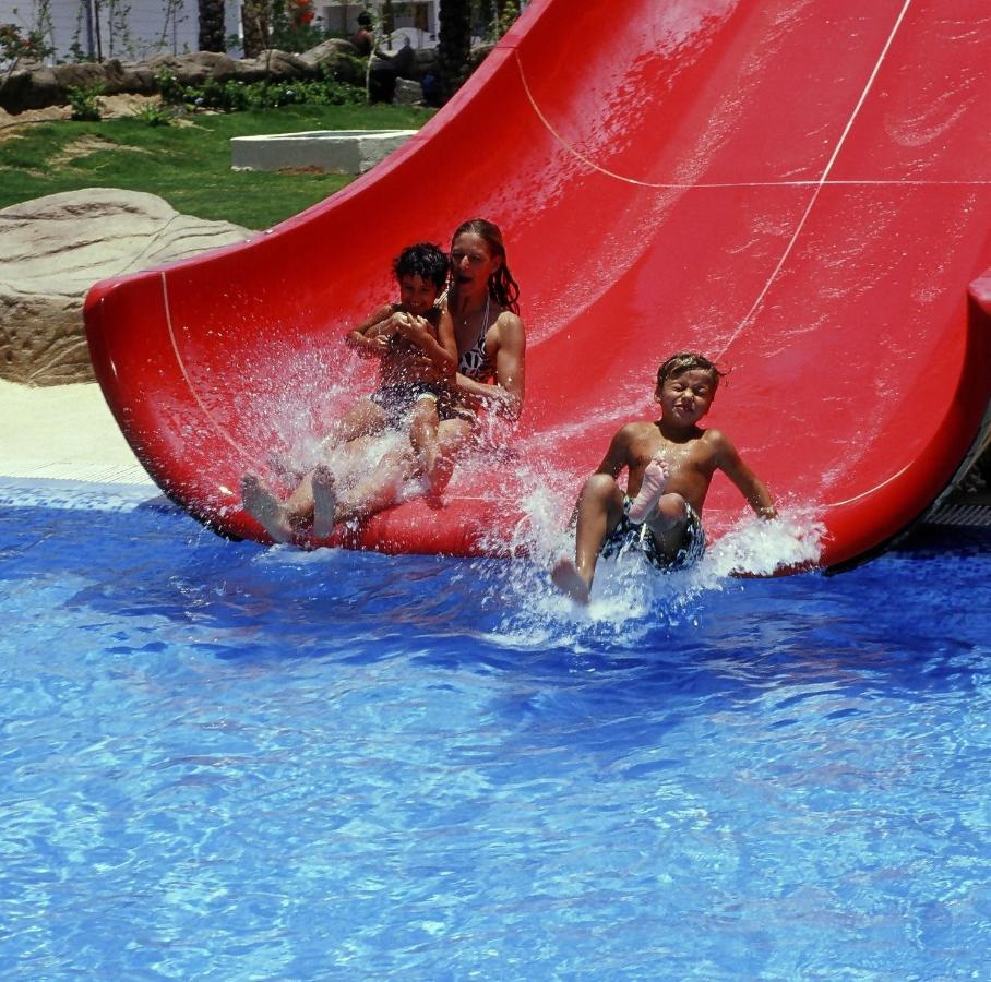 Sharm Dreams Vacation Club - Aqua Park Hotell Eksteriør bilde A water slide