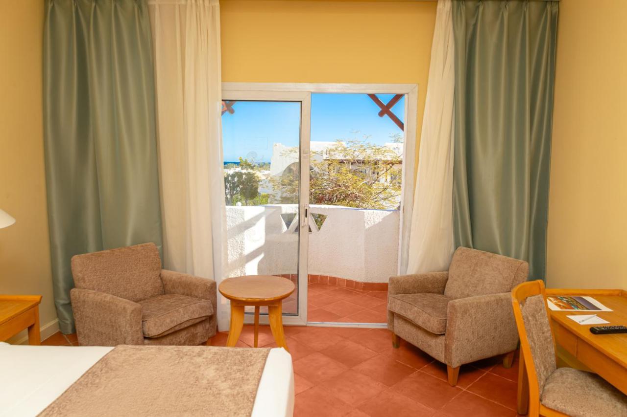 Sharm Dreams Vacation Club - Aqua Park Hotell Eksteriør bilde A room at the hotel